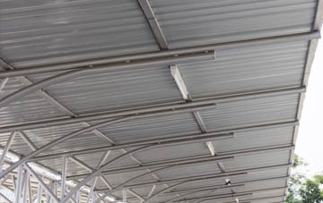 installing Galon Uchaf metal roofing